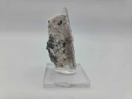 Phenakite on Quartz