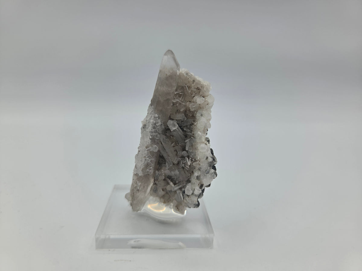 Phenakite on Quartz